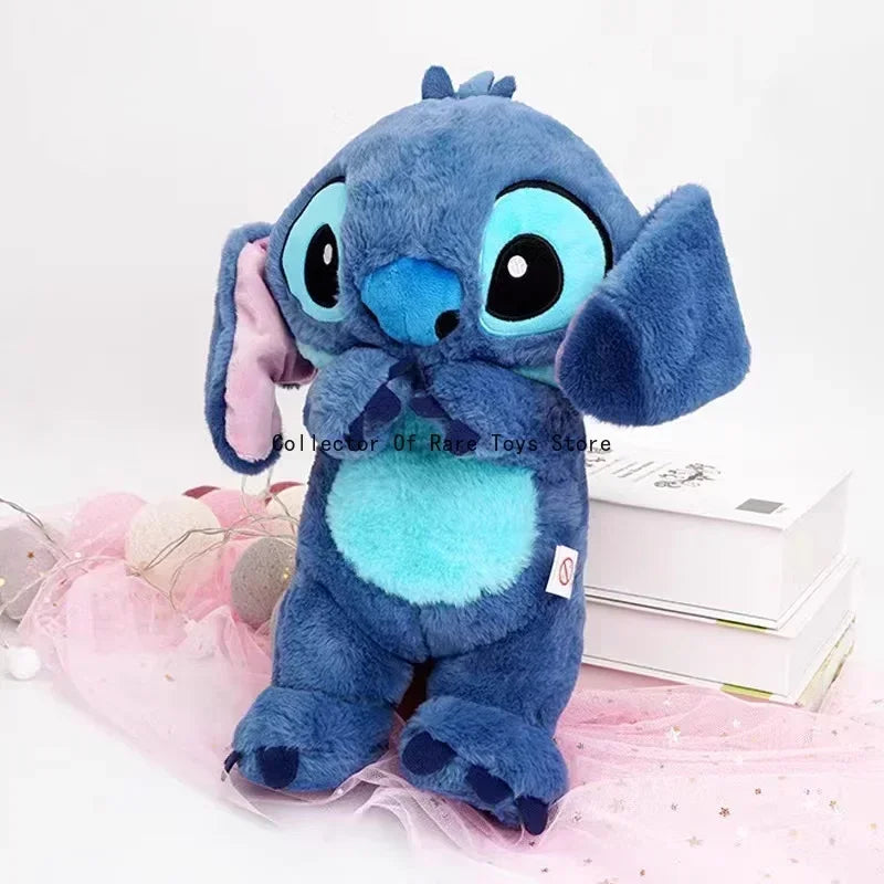 Pelúcia Little Stitch com som, luzes e movimento